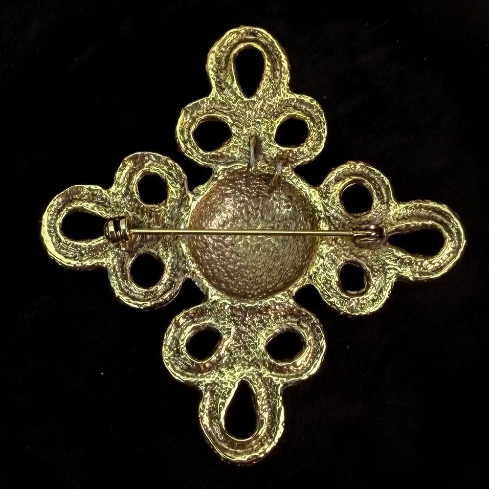 Aged brasstone vintage weighted brooch, pin